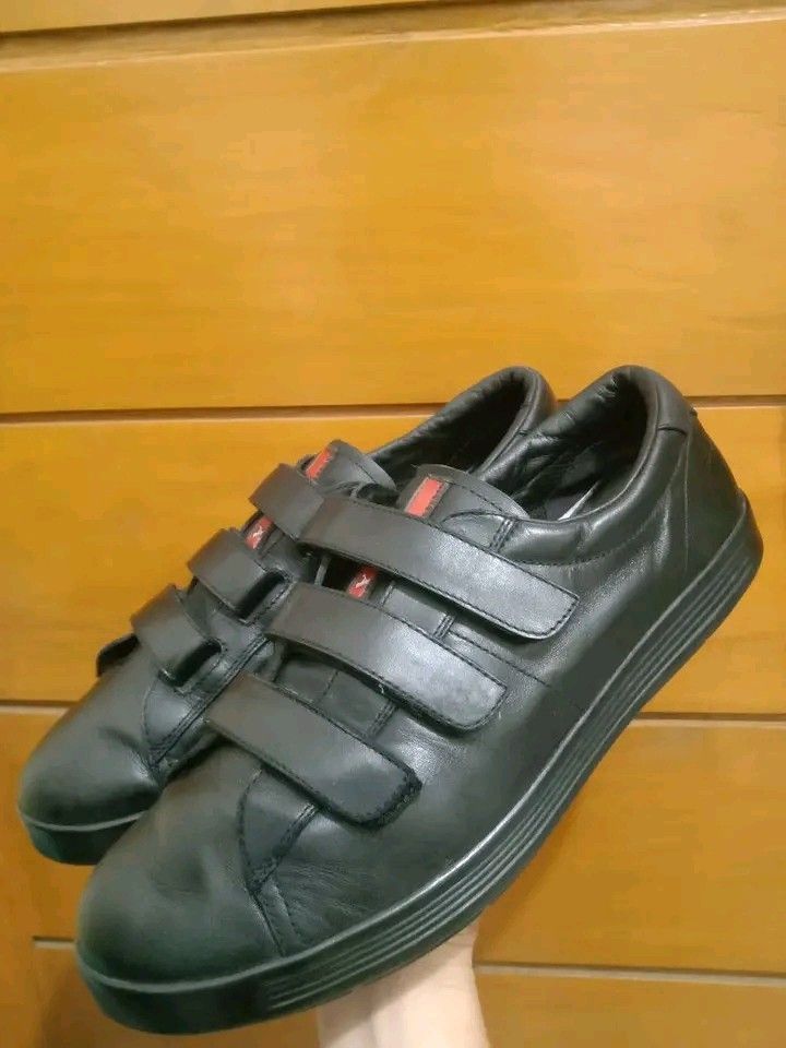 Prada Black Leather with strap Sneakers (Category: Sneakers) located in Koronadal. Submitted by joeannmahi28609 (Listing ID 1464809276, Image 2). Description: prada black leather printed black with stripe sneakers made in Vietnam size eir eur 41.5 for men only coded in excellent condition ukay source wow sino bet nito ganda ni Prada solid paunahan dito mga boss mine nyo na.