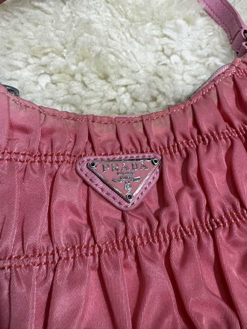 Prada Pink Ruched Nylon Mini Shoulder Bag (Category: Luxury Bags & Wallets) located in Baguio. Submitted by thriftedbaguio (Listing ID 1464870447, Image 2). Description: Very Good Condition .