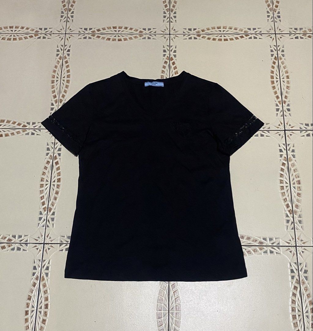 Prada shirt(womens) (Category: Blouses) located in Cebu City. Submitted by hustler_69 (Listing ID 1464901325, Image 1). Description: Prada shirt(womens) Size medium 16.5 width 23 length Excellent condition Details are all posted.