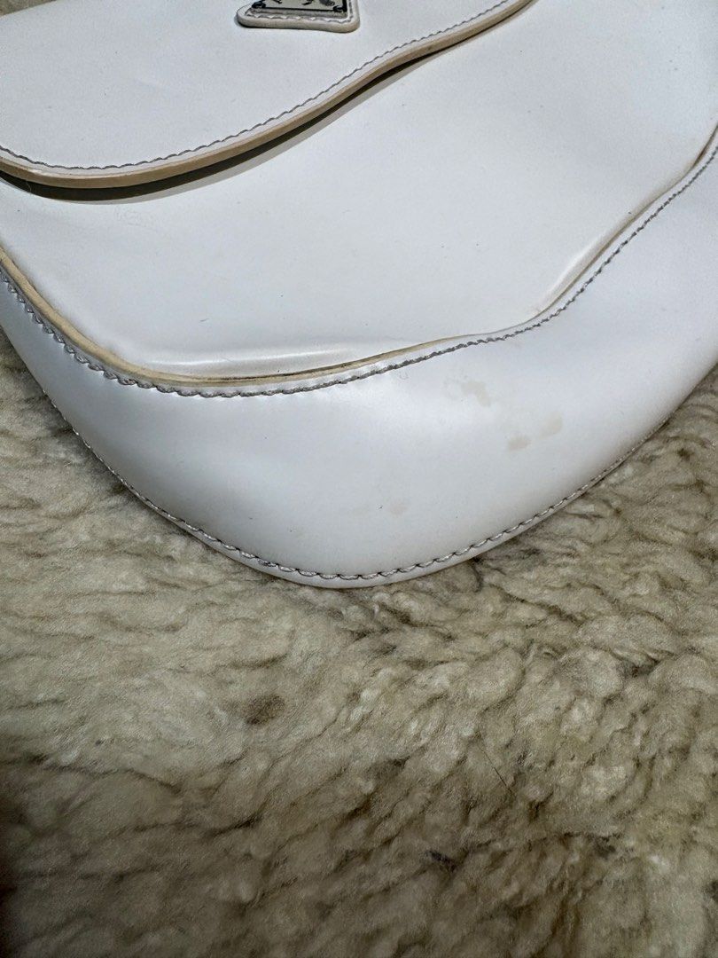 Prada White Leather Shoulder Bag (Category: Luxury Bags & Wallets) located in Baguio. Submitted by thriftedbaguio (Listing ID 1464870368, Image 2). Description: Very Good Condition .