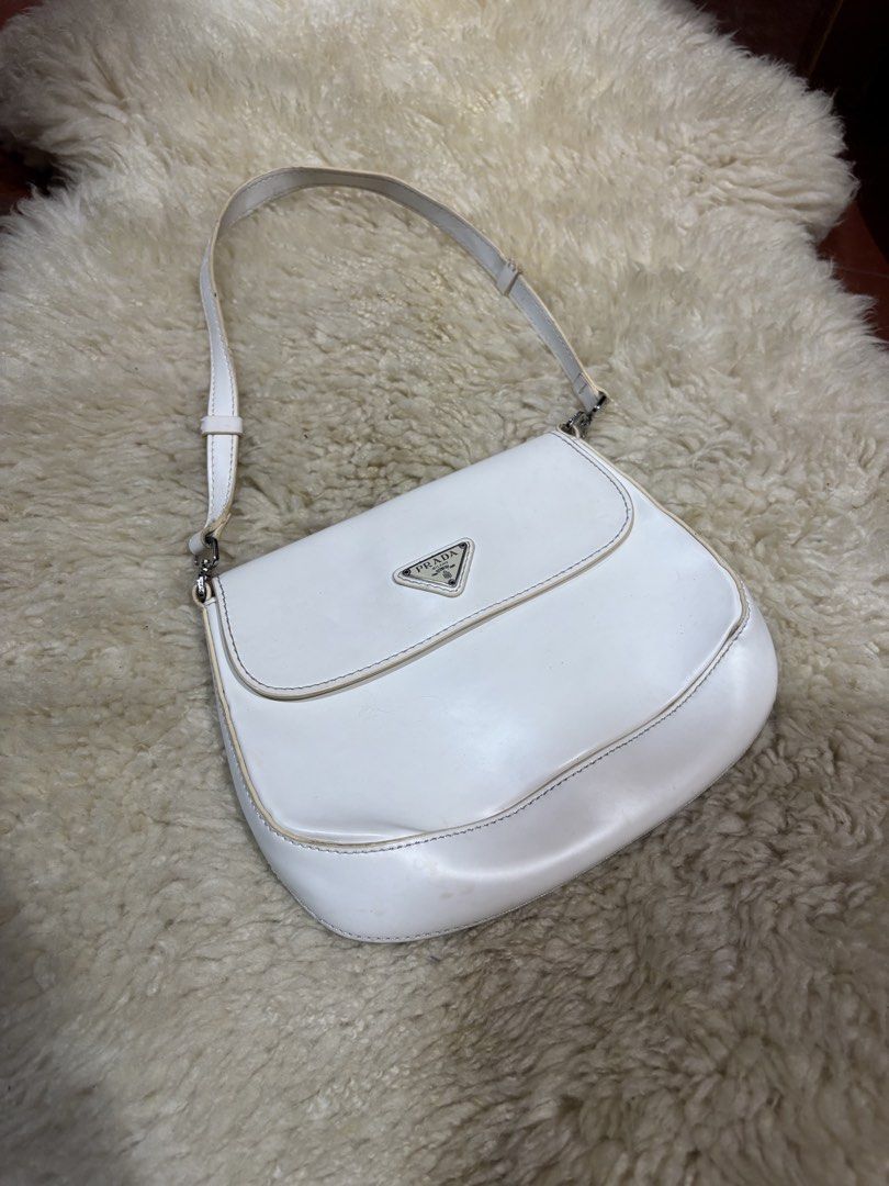 Prada White Leather Shoulder Bag (Category: Luxury Bags & Wallets) located in Baguio. Submitted by thriftedbaguio (Listing ID 1464870368, Image 1). Description: Very Good Condition .