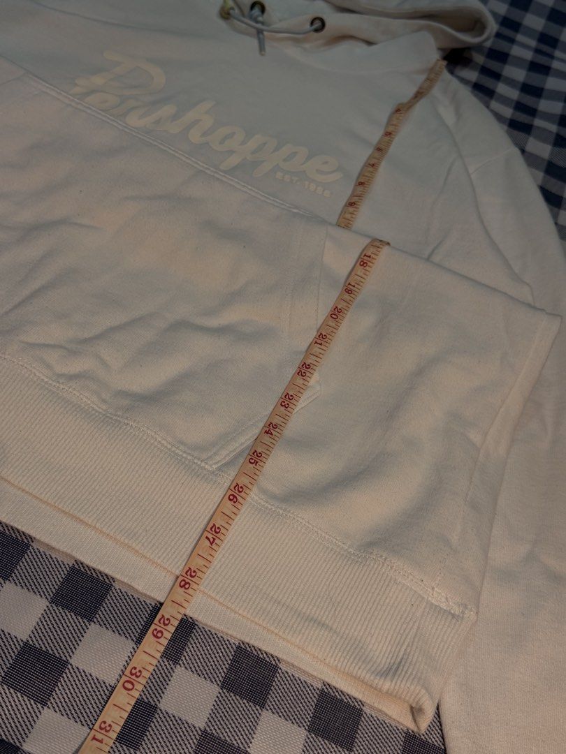 Preloved- Penshoppe Hoodie 🤍 (Category: Coats, Jackets and Outerwear) located in Manila. Submitted by littlefindsbyb (Listing ID 1464780419, Image 3). Description: 🤍 Preloved Penshoppe Cream Logo Hoodie 🤍 Classic, clean, and comfy everyday hoodie in a soft cream/off-white shade — an easy-to-style staple that pairs well with almost anything. 📏 Measurements: • Chest: ~42” • Length: ~28–29” • Best fits Medium–Large 👕 Details: • Brand: Penshoppe