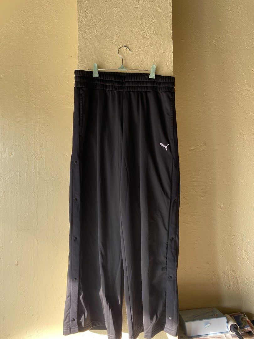 Puma trackpants (Category: Joggers) located in Calapan. Submitted by mnlhabithrift23 (Listing ID 1464900364, Image 1). Description: Waist : 34 up Length : 40 Leg hole : 12 Color rate : 9.8/10 Issue : none.