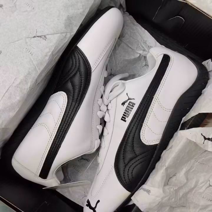 Puma White and Black Sneakers (Category: Sneakers) located in Davao. Submitted by luckyturtle.aa6ccf (Listing ID 1464793680, Image 1). Description: - Brand new in original box with tissue paper - Classic white and black leather design with contrast side stripes - Clean stitching and crisp branding - Comfortable flat rubber sole with white laces - Fresh pair, ready to wear.