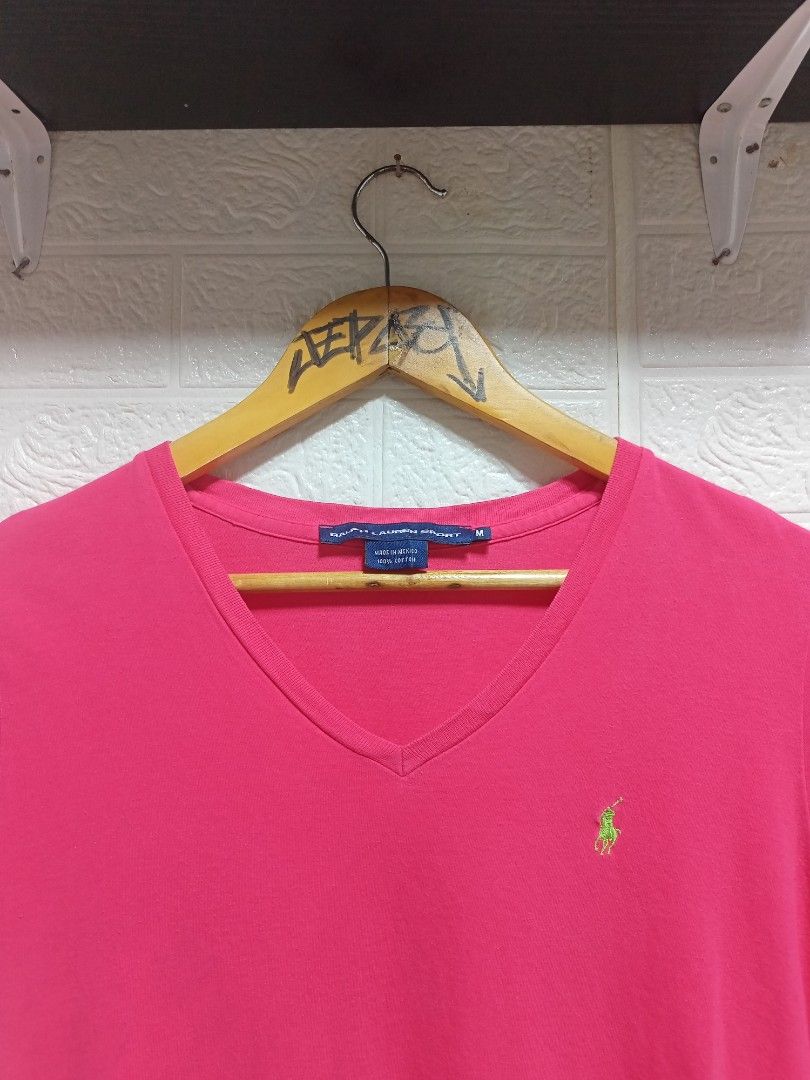 Ralph Lauren (Category: Blouses) located in Danao, Cebu. Submitted by 6000thrifts.ph (Listing ID 1464821822, Image 2). Description: - Brand: Ralph Lauren Sport - Style: V-neck short-sleeve t-shirt - Color: Vibrant Pink with green embroidered logo - Size: Medium (M) - Material: 100% Cotton (Made in Mexico) - Condition: Excellent pre-owned condition, soft and breathable fabric.