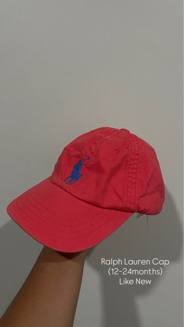 Ralph Lauren Cap 12-24 months (Category: Caps & Hats) located in Bacolod City. Submitted by jmcercado (Listing ID 1464964945, Image 1). Description: - Brand: Ralph Lauren - Color: Bright red with blue embroidered polo logo - Size: Toddler (12 to 24 months) - Features: Classic curved brim and adjustable back strap - Condition: Clean, hardly worn, great for sunny days.