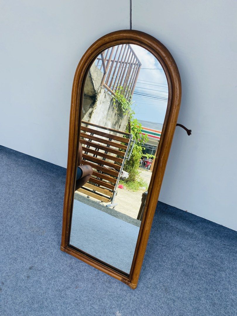 Rattan Mirror (Category: Mirrors) located in Manila. Submitted by elliefurnies31 (Listing ID 1464797590, Image 2). Description: "JAPAN SURPLUS" RATTAN MIRROR SIZE: 16L" x 38H" inches (AS-IS ITEM) IN GOOD CONDITION.
