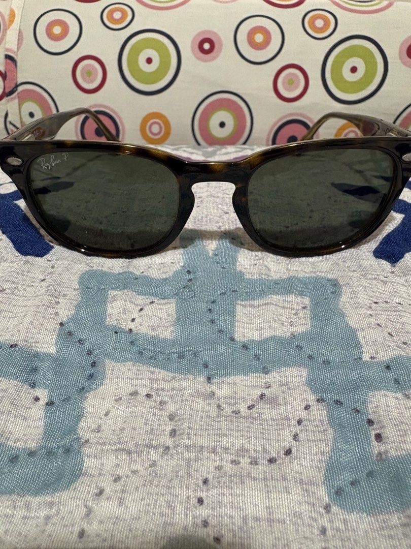 Ray-Ban Tortoiseshell Polarized Sunglasses (Category: Sunglasses & Eyewear) located in Pasig City. Submitted by anenri (Listing ID 1464807385, Image 1). Description: - Brand: Ray-Ban - Style: Classic Wayfarer - Frame: Tortoiseshell - Lenses: Dark polarized with signature logo and authenticity stamp - Details: Metal Ray-Ban script badge on temples - Condition: Clean overall, minimal wear on arms.