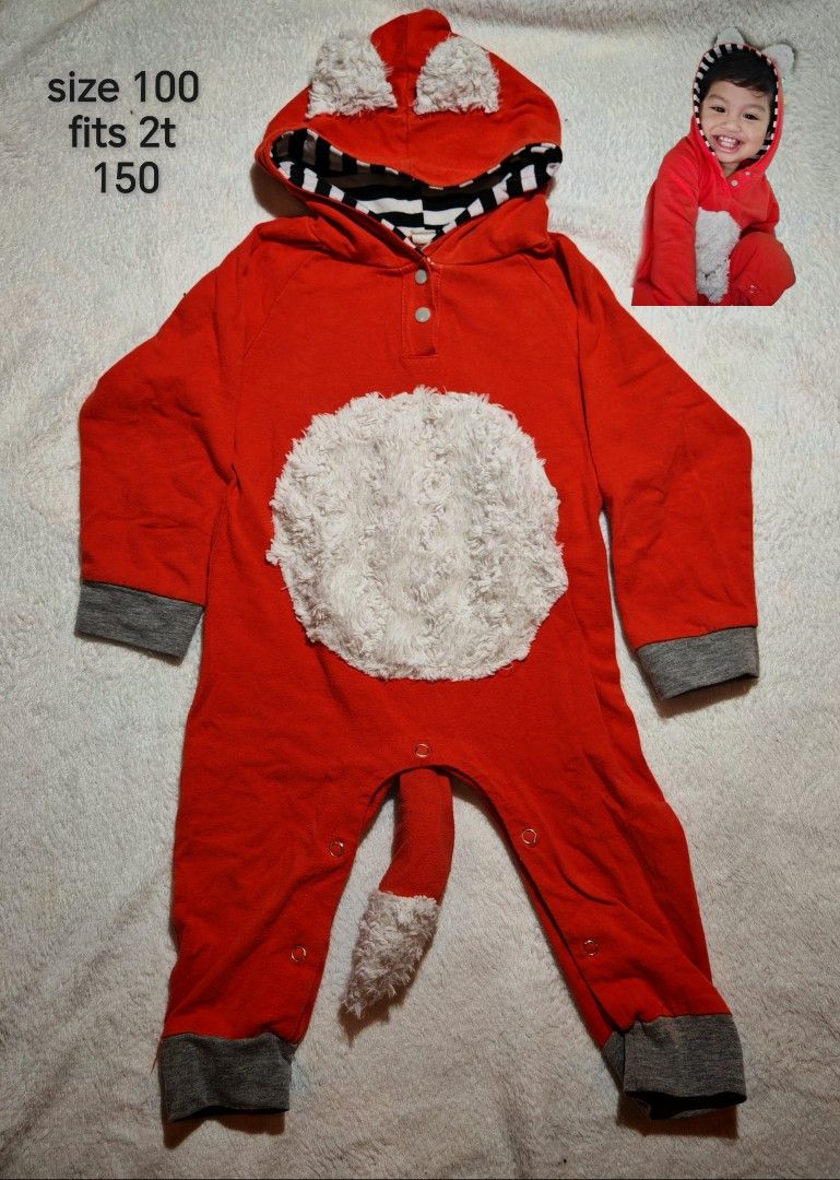 Red Fox Costume Romper Size 100 Fits 2T (Category: Babies & Kids Fashion) located in Quezon City. Submitted by maypamor (Listing ID 1464864428, Image 1). Description: - Adorable red fox costume romper for toddlers - Fits around size 2T (tagged size 100) - Features a fluffy white belly and attached tail - Hood with cute fuzzy ears and black-and-white striped lining - Grey ribbed cuffs at wrists and ankles for a snug fit - Snap buttons down the fro