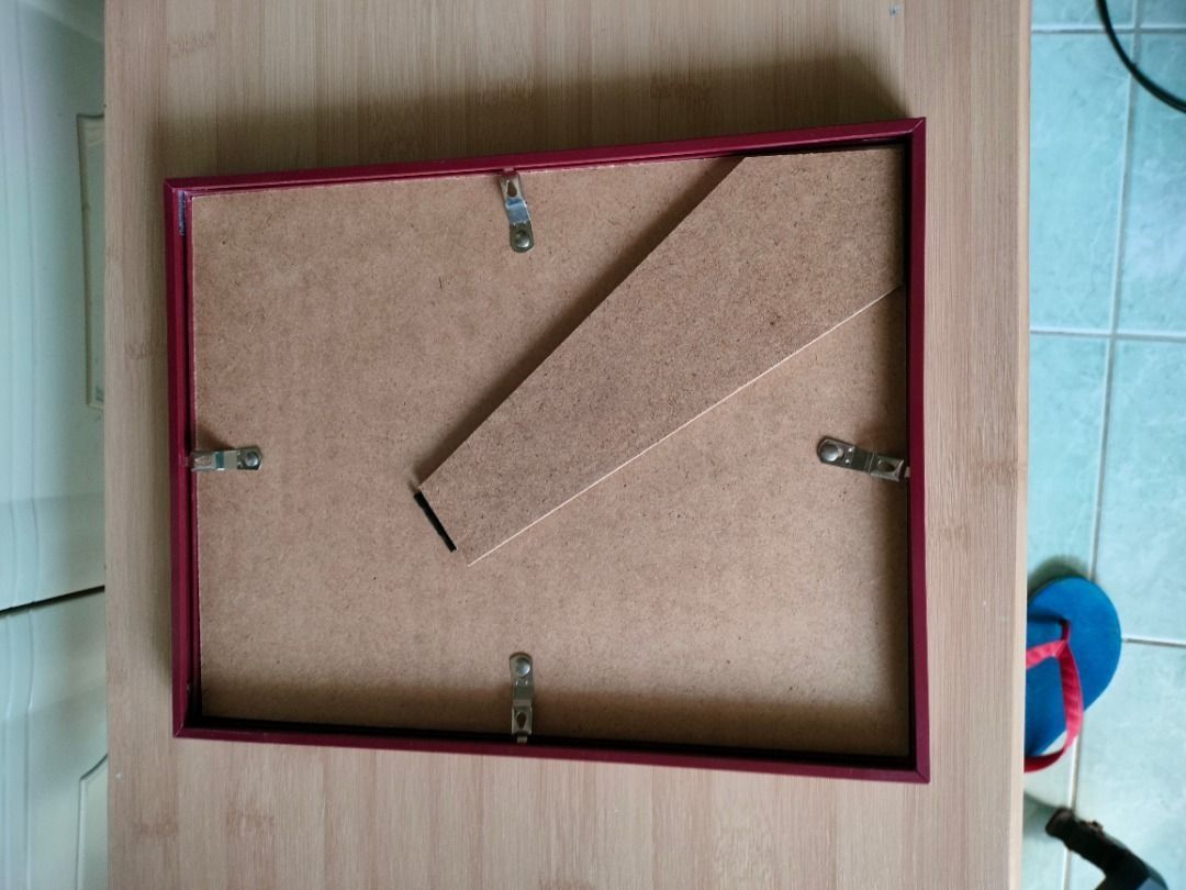 Red Picture Frame with Stand (Category: Frames & Pictures) located in San Pedro. Submitted by leviandmillie (Listing ID 1464960110, Image 2). Description: ‼️PICK UP ONLY‼️ ‼️Kindly read all the information.‼️ 💰Price: ₱100 Elegant burgundy/dark red photo frame suitable for family photos, portraits, certificates, artwork, or home décor. DETAILS: • Burgundy / dark red frame • Landscape or portrait display depending on setup • Built-in tabletop stan