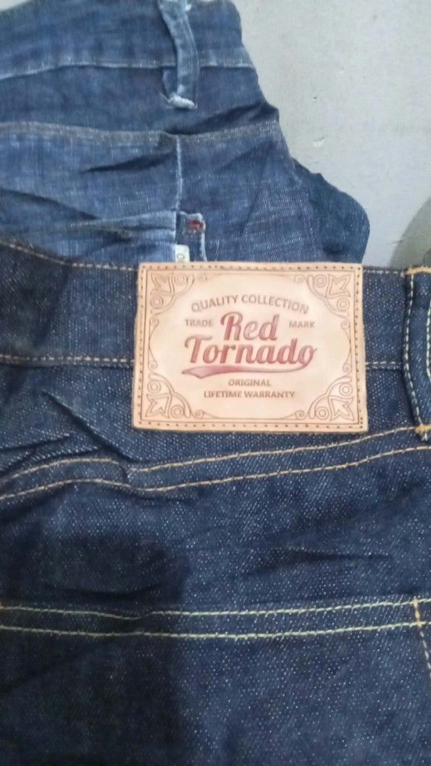 Red Tornado Selvedge Denim Jeans (Category: Jeans) located in Meycauayan. Submitted by ranelement38735 (Listing ID 1464874942, Image 1). Description: - Brand: Red Tornado - Color: Deep Indigo - Material: Heavyweight raw denim - Details: Classic selvedge ID on outseam and coin pocket - Stitching: Orange contrast stitching - Patch: Leather back waistband patch - Lining: Japanese branding and typography prints on inner pockets - Closure: Button fly 