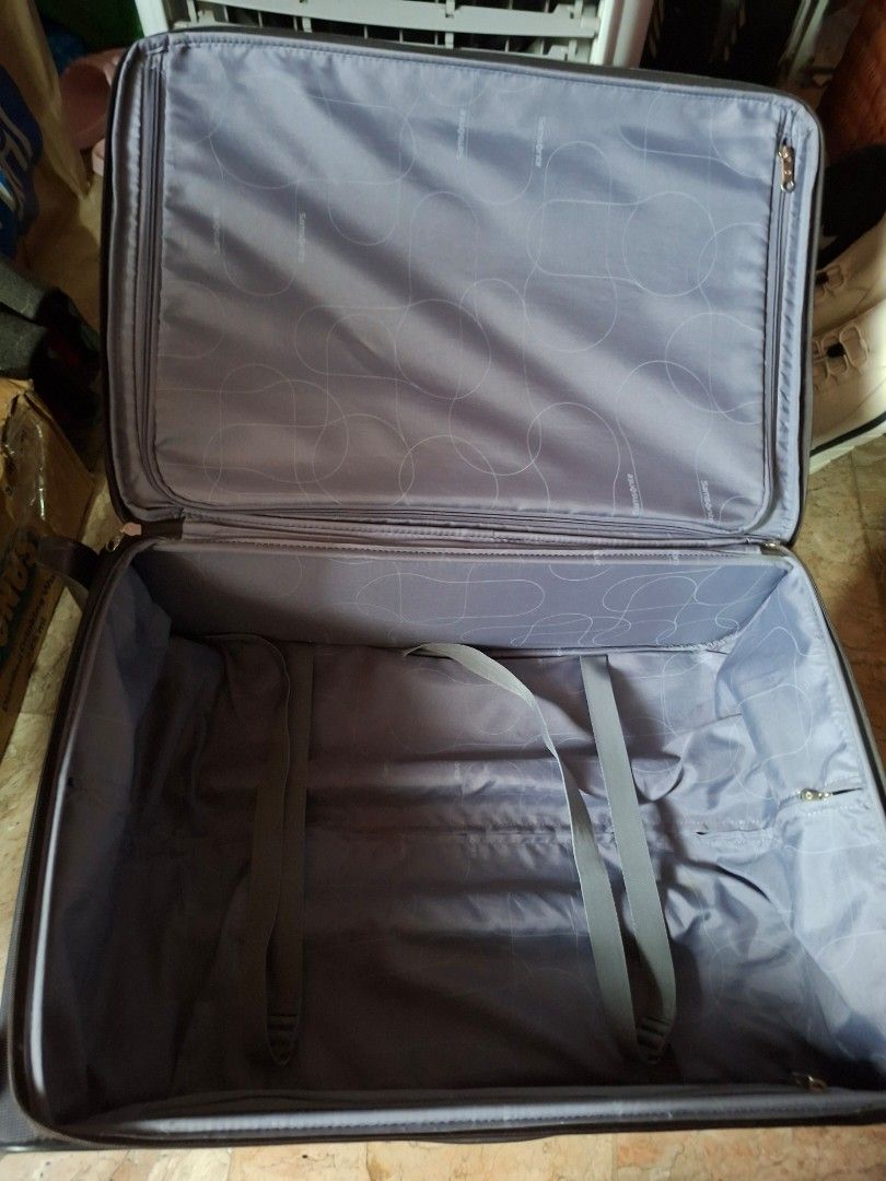 REPRICED ! Samsonite Black Softside Spinner Luggage 16 x 22 inch Medium (Category: Luggage) located in Bulacan. Submitted by rafaesarisari (Listing ID 1460027457, Image 3). Description: - Brand: Samsonite - Type: Softside Luggage - Color: Black - Features: Wheels for easy rolling, front pockets for quick access - Condition: Used, with some scuffs on the bottom from normal wear. - Suitability: Great for travel, plenty of life left. No major issue.