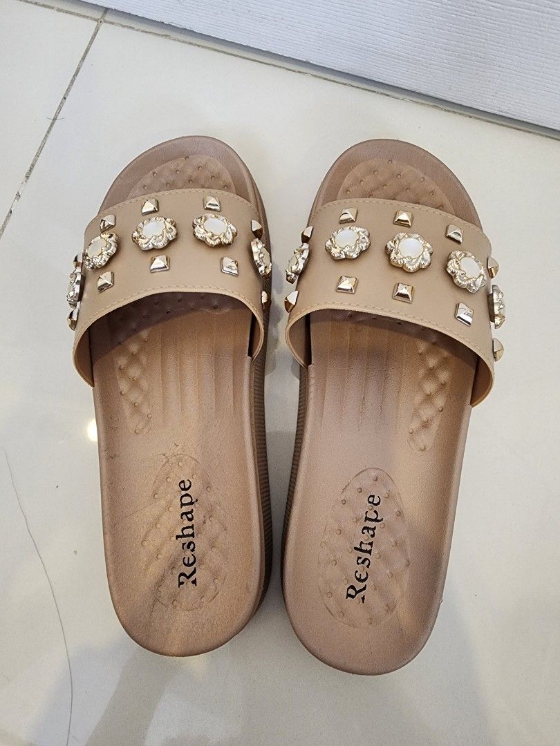 Reshape Decorated Slides Korean Style Size 40 (Category: Flats & Sandals) located in Quezon City. Submitted by pinkyshang (Listing ID 1464906976, Image 3). Description: - Brand: Reshape Decorated Slides Korean Style - Style: Casual Slip-On Sandals - Size: 40 (Model: LA-2258) - Color: Beige - Details: Upper strap decorated with metallic studs, floral accents and faux pearls - Comfort: Platform sole with a textured footbed - Condition: 2nd hand. Cl