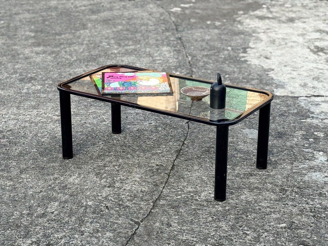 Retro-modern black glass coffee table (Category: Tables & Sets) located in Bulacan. Submitted by rock_off.thriftshop.ph (Listing ID 1464942124, Image 2). Description: .
