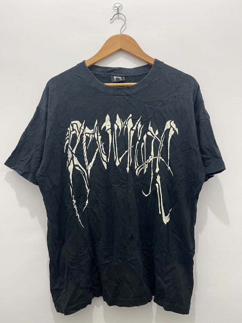 Revenge Bone Skull (Category: Tshirts & Polo Shirts ) located in Santa Rita. Submitted by papagabs01 (Listing ID 1464883236, Image 2). Description: Dimes 23x28 9.5/10 Color Rate ✨ Issue nasa dulo ng pic, hairline na sa back print No pinhole ‼️ - Brand: Revenge - Style: Classic streetwear graphic tee - Color: Black (with slight fade from wash and wear) - Size: XL - Design: White bone typography on chest, large screaming skull on back - Details: Ma