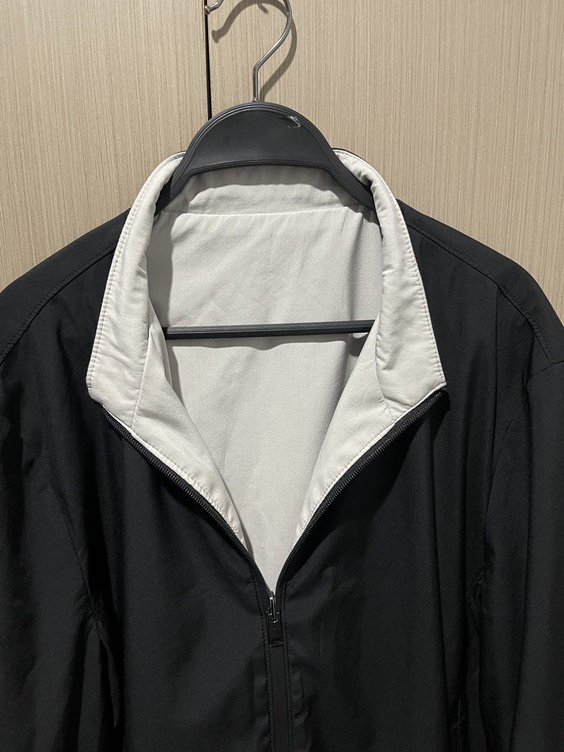 Reversible Black and Off-White Bomber Jacket (Category: Coats, Jackets and Outerwear) located in Taguig. Submitted by shennelaluuh (Listing ID 1464835642, Image 3). Description: - 2-in-1 reversible design: solid black and off-white - Full front zip closure - Comfortable ribbed collar, cuffs, and hem - Functional side pockets on both sides - Great layering piece for cool weather.