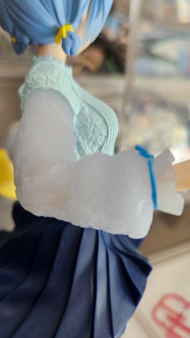 Re:Zero Rem Sweater Ver. PVC Figure (Category: Figurines & Statues) located in Taguig. Submitted by noblerabbit.c3b5a8 (Listing ID 1464916745, Image 3). Description: - Character: Rem from Re:Zero - Appearance: Blue twin tails with pink hairclips, light blue textured sweater, dark blue pleated skirt, and translucent sleeves - Accessories: Small yellow handbag with a chain strap - Condition: Loose/ No Box - Price is Negotiable.