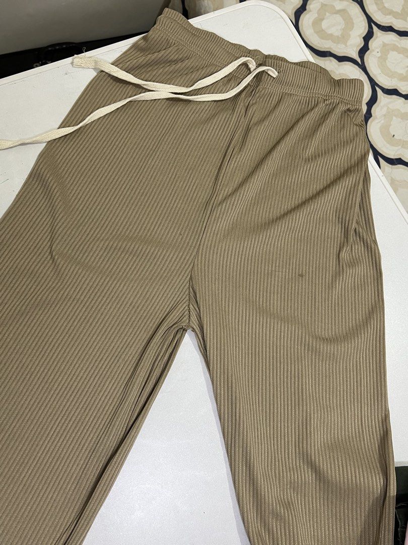 Ribbed Wide Leg Lounge Pants with Drawstring Taupe (Category: Jeans) located in Manila. Submitted by sennisen (Listing ID 1464922342, Image 1). Description: - Color: Taupe - Design: Fine vertical ribs with a wide leg fit - Waistband: Elastic waist with thick cream drawstring - Material: Super comfortable and soft fabric - Best for: Relaxing at home or casual errands.