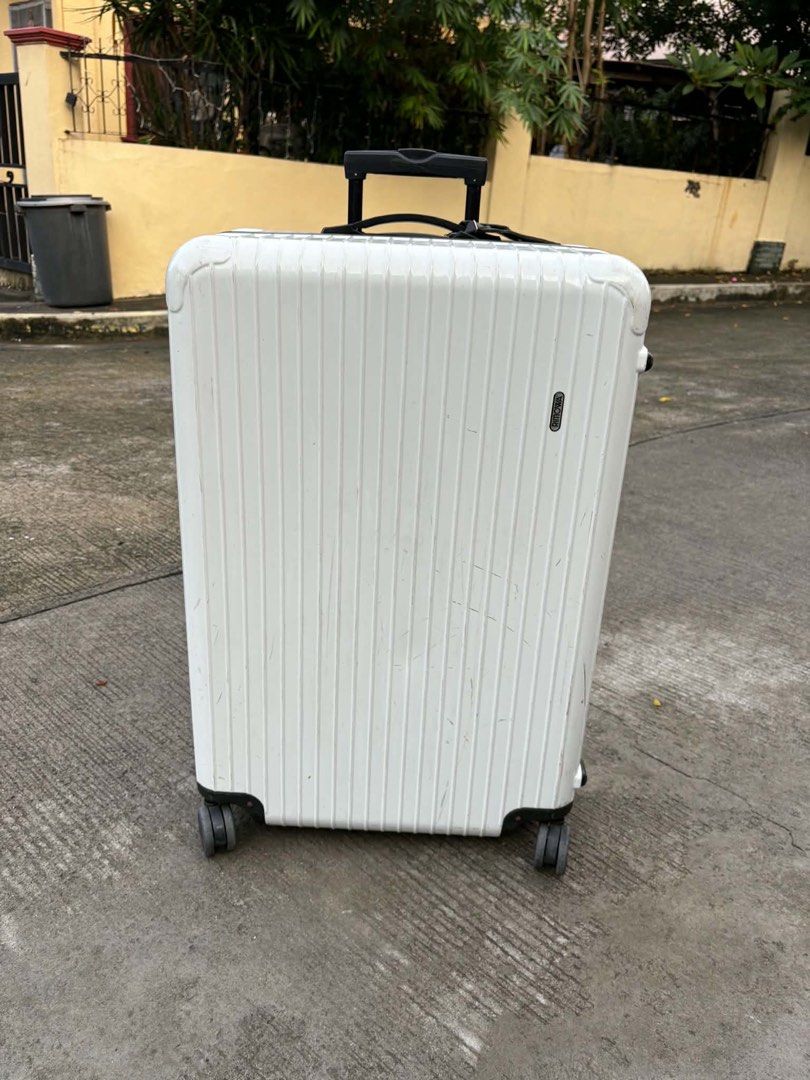 Rimowa luggage Large (Category: Luggage) located in Calamba. Submitted by japanitems18 (Listing ID 1464774176, Image 2). Description: Rimowa Large Repaired sa ilalim, super tibay na po nya Issue: my missing part lang check pics for details 10k only loc: Calamba laguna we ship nationwide.