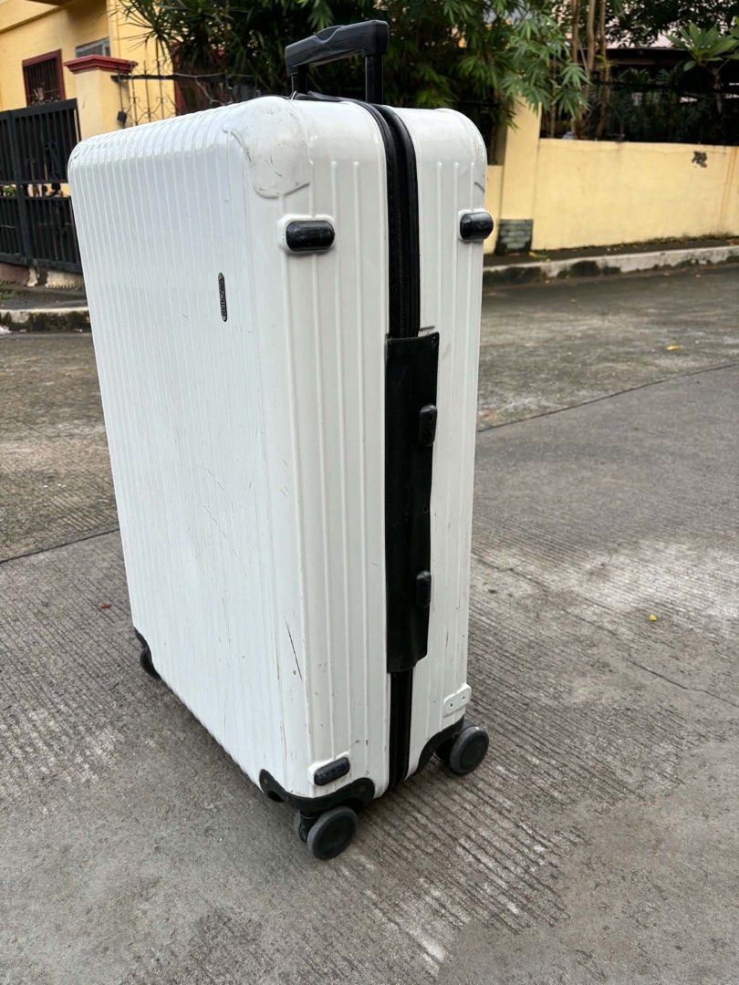 Rimowa luggage Large (Category: Luggage) located in Calamba. Submitted by japanitems18 (Listing ID 1464774176, Image 3). Description: Rimowa Large Repaired sa ilalim, super tibay na po nya Issue: my missing part lang check pics for details 10k only loc: Calamba laguna we ship nationwide.