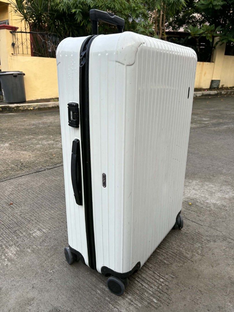 Rimowa luggage Large (Category: Luggage) located in Calamba. Submitted by japanitems18 (Listing ID 1464774176, Image 1). Description: Rimowa Large Repaired sa ilalim, super tibay na po nya Issue: my missing part lang check pics for details 10k only loc: Calamba laguna we ship nationwide.