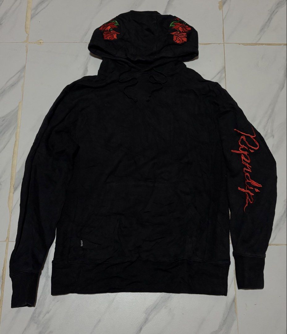 Ripndip Black Rose Skeleton Hand Embroidered (Category: Hoodies) located in Baguio. Submitted by thriftedbaguio (Listing ID 1464830853, Image 1). Description: Excellent Condition Size Small Tagged Dimensions 20*26 Color rate 10 - Brand: Ripndip - Color: Black - Details: Detailed embroidery on back (skeleton hand flipping the bird & red roses), hood (roses), and left sleeve (red Ripndip text) - Features: Drawstring hood, front kangaroo pocket, rib