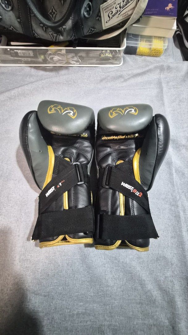 Rival RFX Guerrero Bag Gloves (Category: Combat Sports) located in Paranaque City. Submitted by hayoonoh (Listing ID 1464884749, Image 1). Description: Item : Rival RFX Guerrero-V (Gray, 8oz) Original Price : P 11,000 Selling Price : P 5,000 Details : 9/10 condition. Bag Glove. HDE-F - Brand/Model: Rival RFX Guerrero Bag Gloves - Colorway: Grey, Black, and Gold - Material: Premium handcrafted leather build - Protection: High-density foam padding 