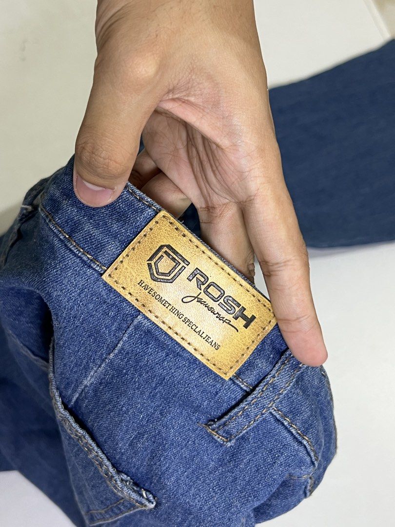 ROSH Jeans Blue Denim Pants (Category: Jeans) located in Manila. Submitted by sennisen (Listing ID 1464924839, Image 3). Description: - Brand: ROSH - Color: Classic Blue Denim - Fit: Straight fit - Details: Front patch pockets, button zipper fly, and standard belt loops - Branding: Leather brand patch on the back waistband.