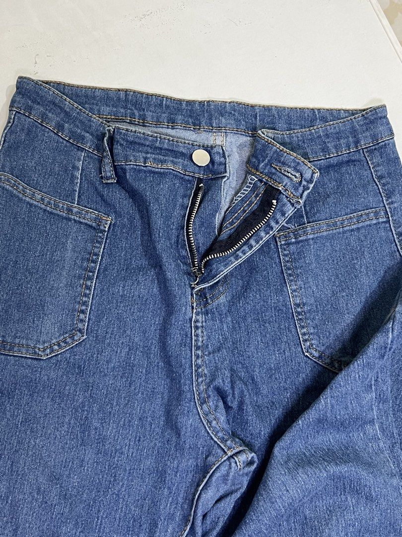 ROSH Jeans Blue Denim Pants (Category: Jeans) located in Manila. Submitted by sennisen (Listing ID 1464924839, Image 2). Description: - Brand: ROSH - Color: Classic Blue Denim - Fit: Straight fit - Details: Front patch pockets, button zipper fly, and standard belt loops - Branding: Leather brand patch on the back waistband.