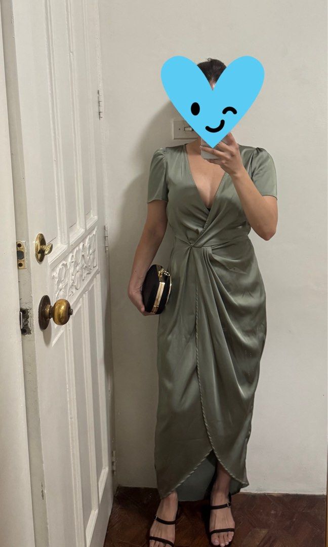 Sage Green Satin Dress (Category: Dresses) located in Manila. Submitted by summer.731 (Listing ID 1464884028, Image 1). Description: - Sage green satin dress - Flattering V-neck - Short sleeves - Draped, wrap-style design - High-low hemline - Perfect for special occasions and evening events.