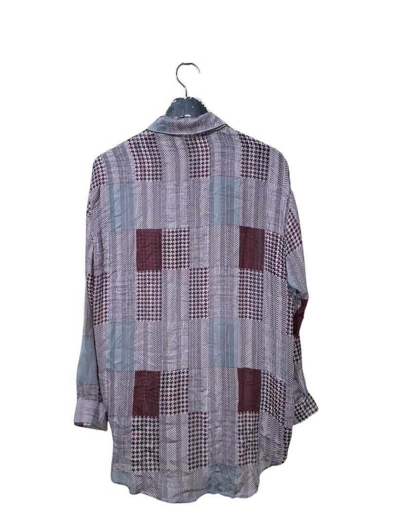 Saint Laurent Paris (Category: Luxury Apparel) located in San Juan (Cabalian). Submitted by ec8thrift (Listing ID 1464903766, Image 2). Description: - Brand: Saint Laurent Paris - Size: Small - Design: Multi-pattern patchwork (houndstooth, herringbone, and solid panels) in burgundy, grey, and white - Details: Features eye-catching gold metallic threading throughout - Pockets: Two chest pockets with button flaps - Closures: Unique pink buttons dow