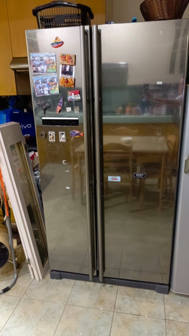 Samsung RSA1NTIS Side-by-Side Refrigerator (Category: Refrigerators and Freezers) located in San Juan City. Submitted by pinkdenxel (Listing ID 1464899748, Image 1). Description: - Model: Samsung RSA1NTIS Side-by-Side Fridge - Finish: Stainless steel with sleek door handles - Control Panel: Convenient exterior digital display - Storage: Ample interior shelves and door bins for both fridge and freezer - Specifications: 912 x 734 x 1789 mm | 110 kg