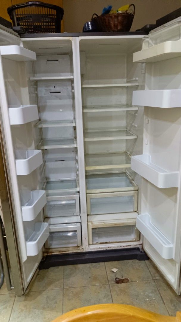 Samsung RSA1NTIS Side-by-Side Refrigerator (Category: Refrigerators and Freezers) located in San Juan City. Submitted by pinkdenxel (Listing ID 1464899748, Image 2). Description: - Model: Samsung RSA1NTIS Side-by-Side Fridge - Finish: Stainless steel with sleek door handles - Control Panel: Convenient exterior digital display - Storage: Ample interior shelves and door bins for both fridge and freezer - Specifications: 912 x 734 x 1789 mm | 110 kg