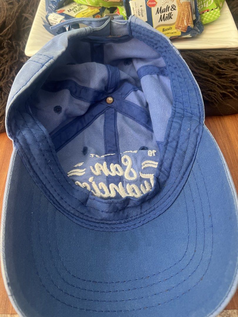 San Francisco East Coast Blue Baseball Cap (Category: Caps & Hats) located in Manila. Submitted by declutteringlangpo (Listing ID 1464780456, Image 3). Description: - Color: Light blue with white San Francisco embroidery - Details: '19' and '83' embroidered on the sides - Fit: Adjustable metal strap in the back for a custom fit - Design: Classic curved brim with breathable top eyelets - Condition: Clean inner lining with standard stitching.