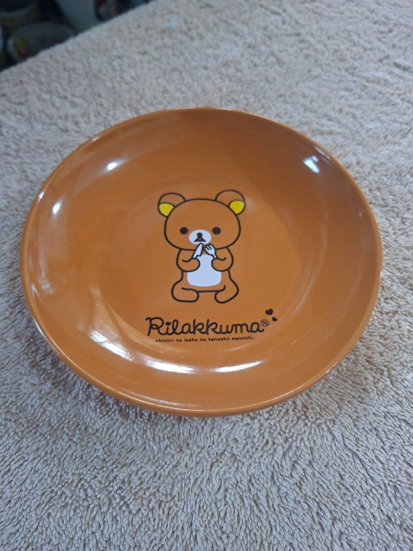 San X and Lawson Rilakkuma Ceramic Plate (Category: Dinnerware & Cutlery) located in Consolacion. Submitted by luxekerei (Listing ID 1464808038, Image 1). Description: - orange Rilakkuma ceramic plate released as part of a San-X and Lawson promotional campaign from 2009..