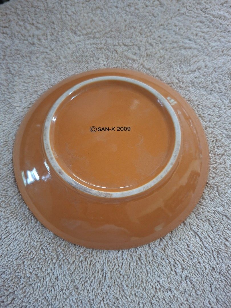 San X and Lawson Rilakkuma Ceramic Plate (Category: Dinnerware & Cutlery) located in Consolacion. Submitted by luxekerei (Listing ID 1464808038, Image 2). Description: - orange Rilakkuma ceramic plate released as part of a San-X and Lawson promotional campaign from 2009..