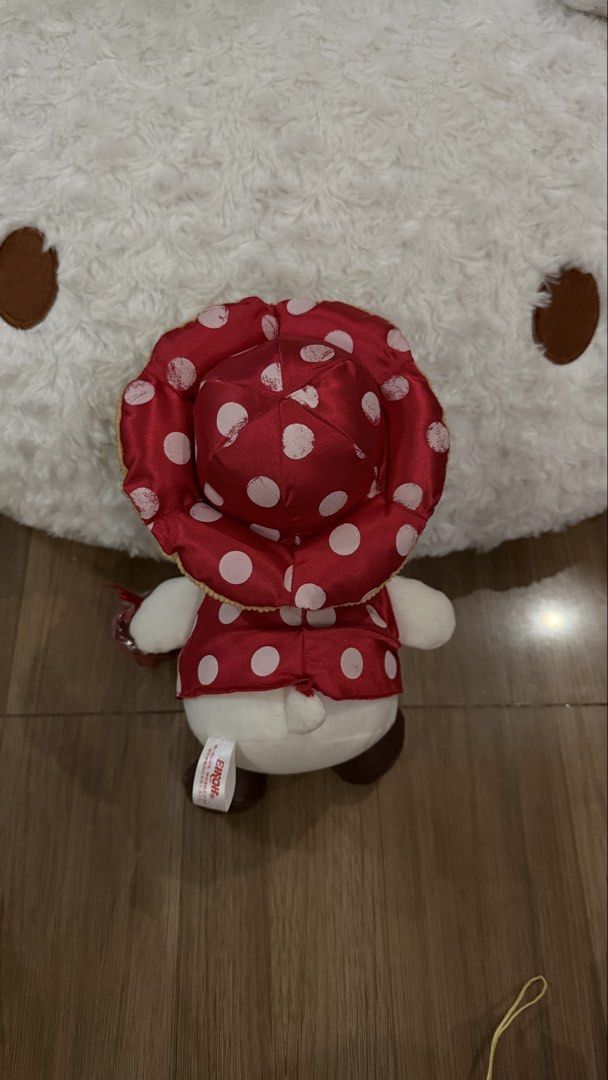 Sanrio Hello Kitty Plush (Category: Plushies & Soft Toys) located in Cabadbaran. Submitted by cinnamororr (Listing ID 1464961957, Image 2). Description: - Authentic Eikoh Kitty plush doll in excellent, clean condition with original cloth tag intact - Dressed in an adorable red polka dot dress, wide-brim hat, and brown boots - Features a cute green bow tie and an acorn and leaf accessory near the ear.