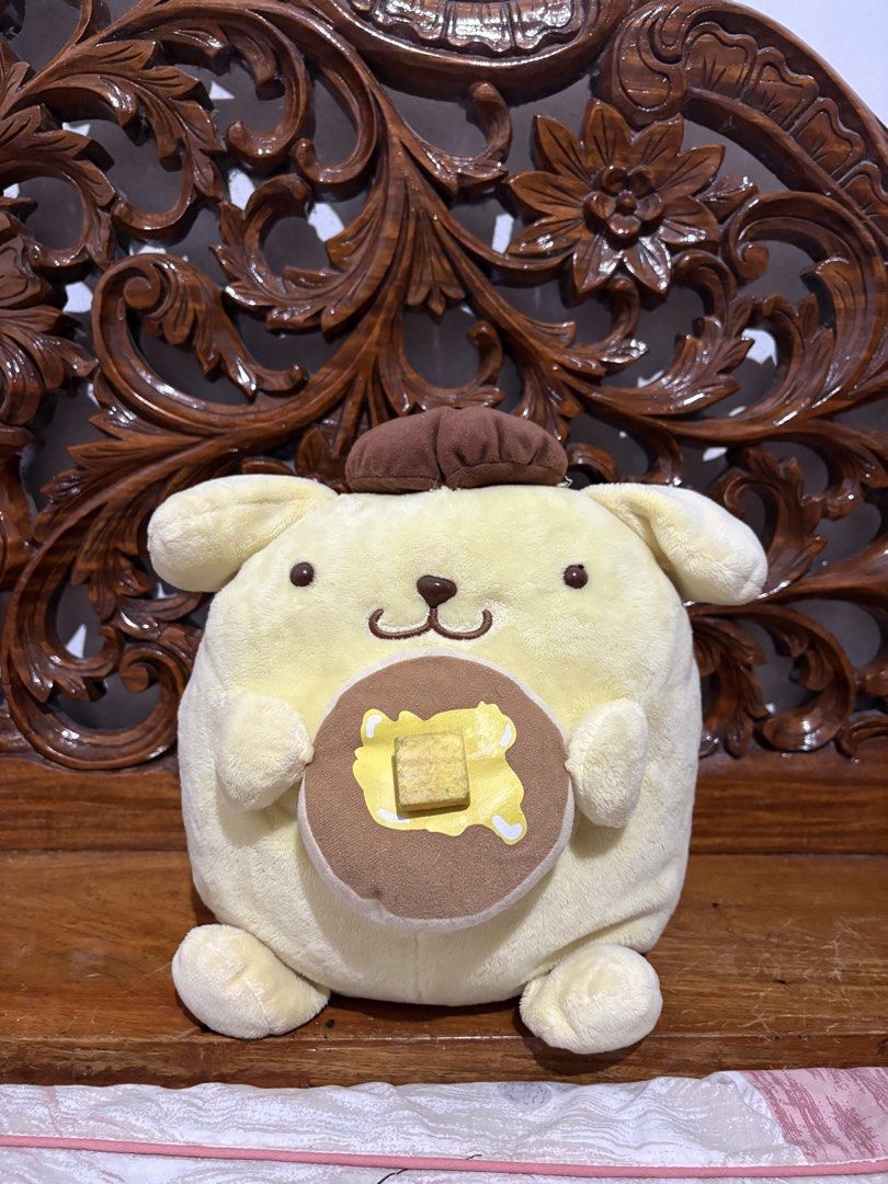 Sanrio Pompompurin Pancake Plush Toy (Category: Plushies & Soft Toys) located in Quezon City. Submitted by rxyel (Listing ID 1464905844, Image 1). Description: - Authentic Sanrio Pompompurin plush - Features Pompompurin holding a sweet pancake with butter - Super soft, round, and squishy cream yellow material with brown beret - Comes with original Sanrio tag (dated 1996, 2017) - Perfect for Sanrio collectors and gift ideas.