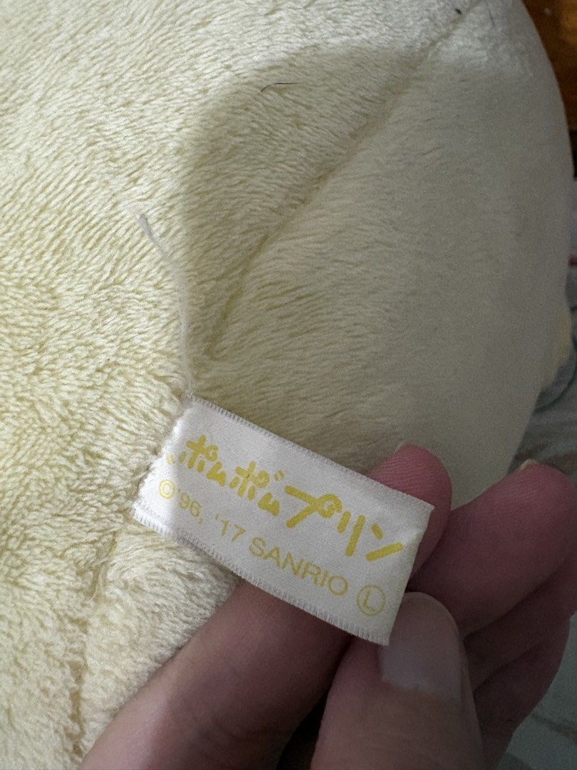 Sanrio Pompompurin Pancake Plush Toy (Category: Plushies & Soft Toys) located in Quezon City. Submitted by rxyel (Listing ID 1464905844, Image 3). Description: - Authentic Sanrio Pompompurin plush - Features Pompompurin holding a sweet pancake with butter - Super soft, round, and squishy cream yellow material with brown beret - Comes with original Sanrio tag (dated 1996, 2017) - Perfect for Sanrio collectors and gift ideas.