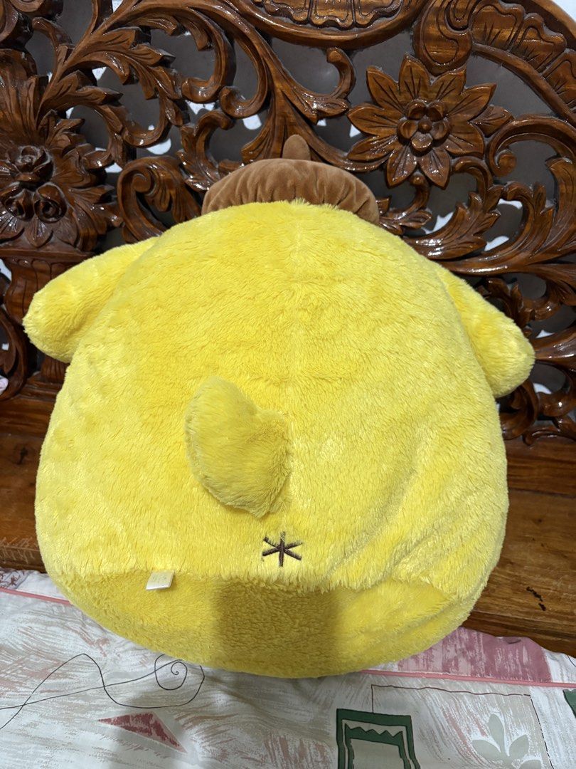Sanrio Pompompurin SEGA Plush Toy (Category: Plushies & Soft Toys) located in Quezon City. Submitted by rxyel (Listing ID 1464905448, Image 2). Description: - Official SEGA prize item with original tag attached - Super soft, bright yellow fur in a round, chubby Pompompurin shape - Features his signature brown beret and cute embroidered face - Includes adorable little feet and a tiny tail in the back - Clean condition and extremely fluffy.