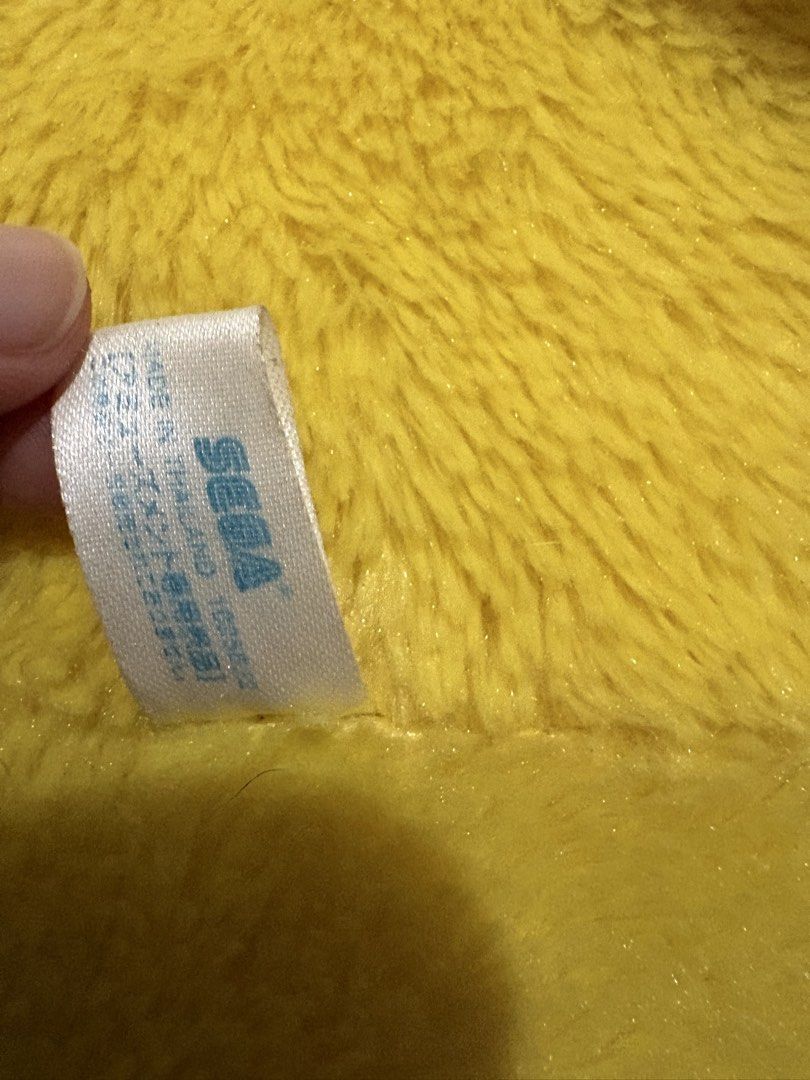Sanrio Pompompurin SEGA Plush Toy (Category: Plushies & Soft Toys) located in Quezon City. Submitted by rxyel (Listing ID 1464905448, Image 3). Description: - Official SEGA prize item with original tag attached - Super soft, bright yellow fur in a round, chubby Pompompurin shape - Features his signature brown beret and cute embroidered face - Includes adorable little feet and a tiny tail in the back - Clean condition and extremely fluffy.