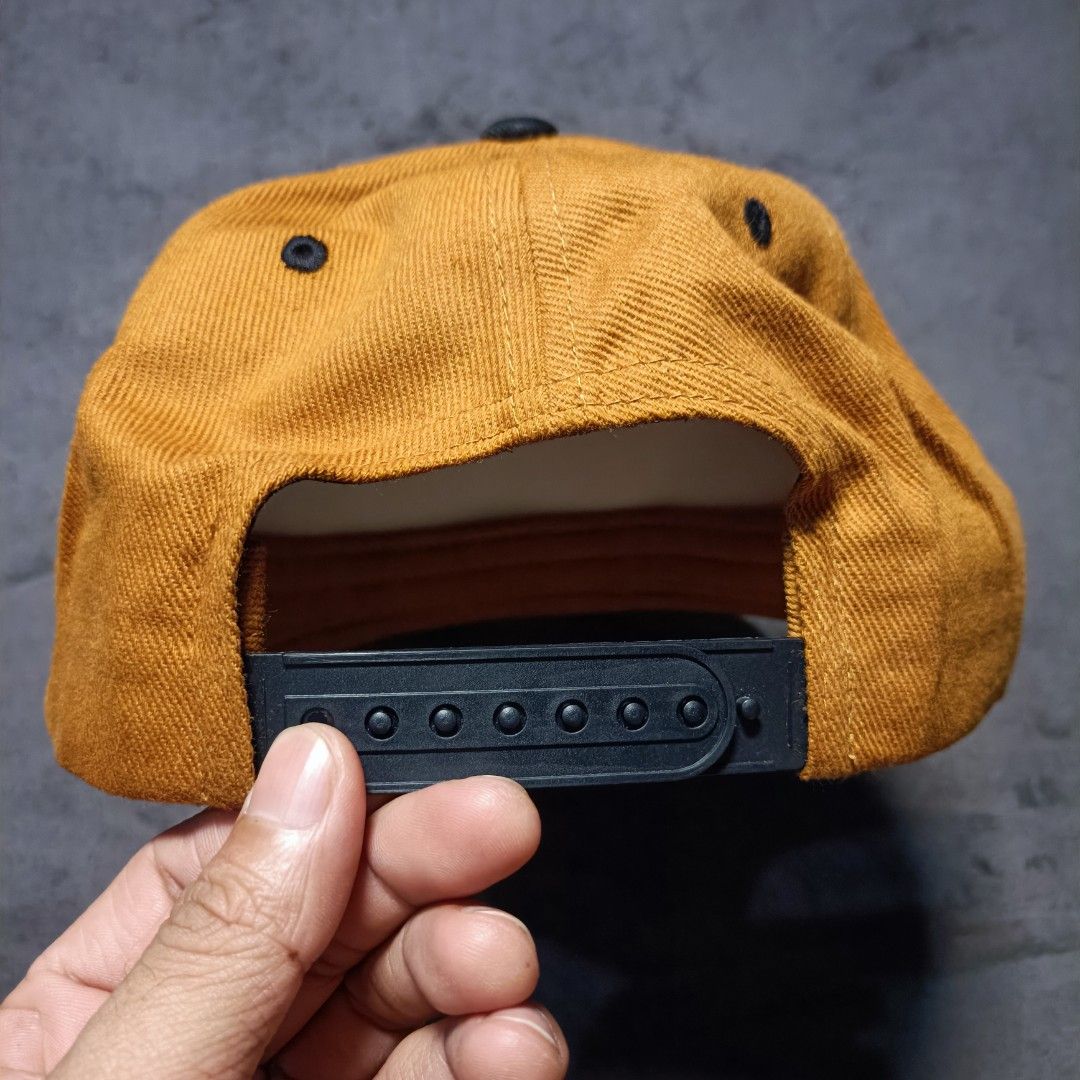 Scooby-Doo Embroidered Snapback Cap Hat Brown Black (Category: Caps & Hats) located in Manila. Submitted by nye.seller (Listing ID 1464886278, Image 3). Description: - Official Warner Bros licensed Scooby-Doo merchandise - Brown crown featuring a large embroidered Scooby face with teal collar and tag - Stylish black flat brim - Adjustable plastic snapback closure for a custom fit - Perfect for fans and collectors - Ships fast from a trusted PH se