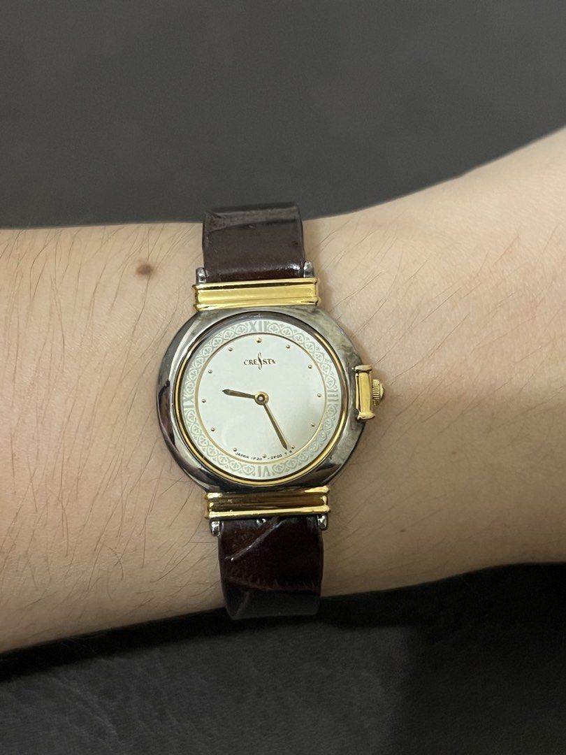 Seiko Cresta Two-Tone Patterned Dial Quartz – Ref. 1F20-0K60 (Category: Women's Watches) located in Quezon City. Submitted by bobby.brown. (Listing ID 1464916135, Image 3). Description: Seiko Cresta Two-Tone Patterned Dial Quartz – Ref. 1F20-0K60 Estimated BMBY: September 1992 An elegant vintage dress watch from Seiko’s Cresta line, featuring a round base metal case with a polished bezel and gold-tone decorative lug elements. The off-white dial i