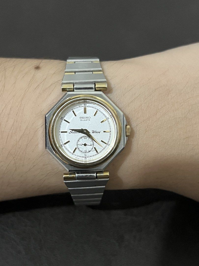 Seiko Silver Wave Small Seconds Two-Tone Quartz – Ref. 1428-0060 (Category: Women's Watches) located in Quezon City. Submitted by bobby.brown. (Listing ID 1464919732, Image 3). Description: Seiko Silver Wave Small Seconds Two-Tone Quartz – Ref. 1428-0060 Estimated BMBY: April 1982 A distinct vintage dress-sports timepiece from Seiko’s iconic Silver Wave line, featuring an angular octagonal two-tone case with a gold-plated bezel and gold-tone crow