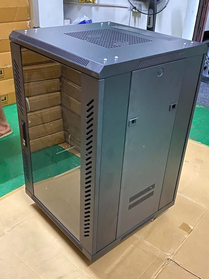 Server rack cabinet | Data Rack (Category: Shelves, Cabinets & Racks) located in Manila. Submitted by cyrenejoye (Listing ID 1464822187, Image 1). Description: - Color: Black - Build: Solid metal construction, sturdy and heavy-duty - Doors & Panels: Glass front door, side panels, side access doors, and vented top panel - Organization: Built-in cable management slots and standard rack mount layout - Condition/Handling: Heavy unit, strict pickup on