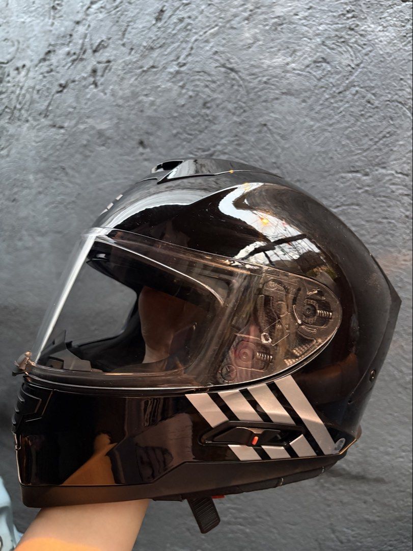 SEVEN Full Face Motorcycle Helmet with Sun Visor (Category: Helmets and other Riding Gears) located in Makati City. Submitted by madephie (Listing ID 1444316072, Image 3). Description: SEVEN po yung brand Minor scratches RFS: wrong size, bihira magamit at nakikiangkas lang minsan - SEVEN Full Face Helmet - Color: Black - Size: XL - Built-in retractable sun visor - ECE R 22-05 Certified - Weight: 1600 +/- 50g.