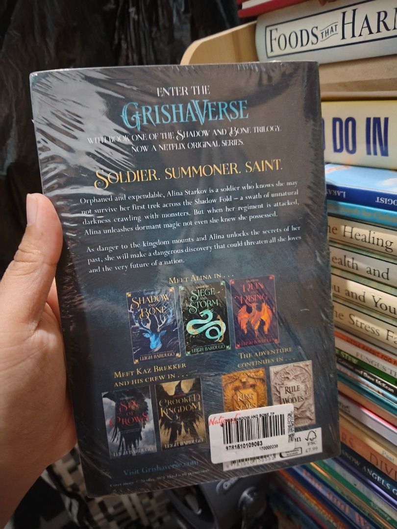 Shadow and Bone by Leigh Bardugo Paperback (Category: Storybooks) located in Taguig. Submitted by jener.498 (Listing ID 1464925810, Image 3). Description: Shadow and Bone by Leigh Bardugo. First book in the Shadow and Bone Trilogy. Netflix tie-in edition with the original series cover art. Still sealed in the original plastic wrapping. Unopened and untouched. Great fantasy read for fans of the show or book collectors wanting a pristine copy..
