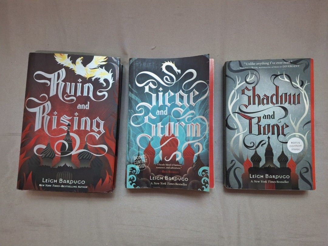 Shadow and Bone Trilogy Boxset by Leigh Bardugo (Category: Storybooks) located in Antipolo. Submitted by a.claudine (Listing ID 1464965219, Image 1). Description: - Title: Shadow and Bone Trilogy by Leigh Bardugo - Format: Paperback set (3 books) - Included: Shadow and Bone, Siege and Storm, Ruin and Rising - Genre: Young Adult (YA) Fantasy.