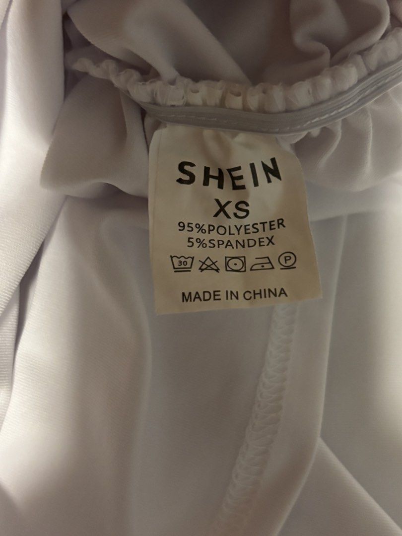 Shein White Asymmetrical Off shoulder top (Category: Longsleeves) located in Balanga. Submitted by hoshiluver (Listing ID 1464855433, Image 2). Description: Used only once. Body hugging.