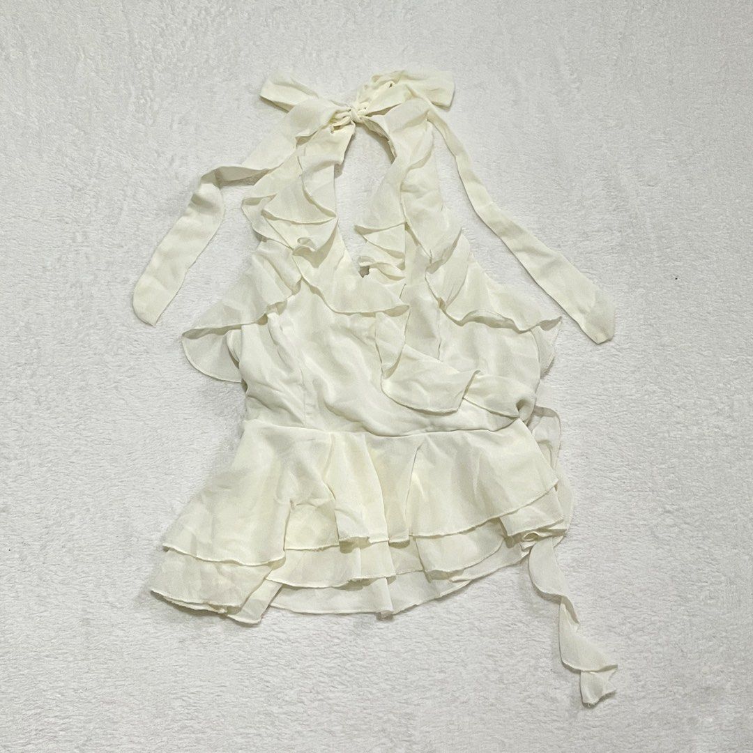 SHEIN White Halter Neck Ruffle Peplum Top XS (Category: Sleeveless) located in Binan City. Submitted by veniceao (Listing ID 1464779621, Image 1). Description: PLEASE READ ❤️ Loc: Manila/Laguna (open for checkout for cheaper sf—starts at ₱20) For sure buyer: 1. Make an offer. 2. Send your details for confirmation 3. Pay until 3pm the next day I confirm the order. Details: - Fits size xs-med - Brand: SHEIN - Color: Cream/ Apricot - Material: Light